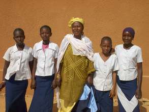 Mrs Moussa,  Home Ec. teacher, and her students