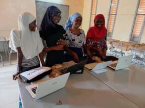 High school girls training on PCs