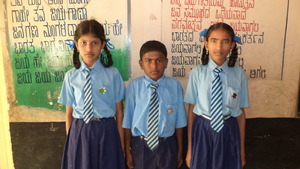 Domlur school kids proudly displaying star badges