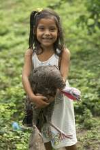 Young girl and a turkey