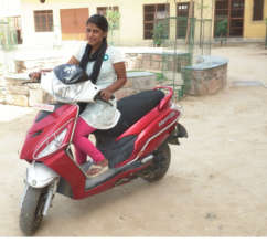 Laxmi with her new Scooter!