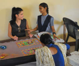 Marie Learning About Embroidery Program