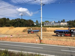 Trucks busy for raising the land level