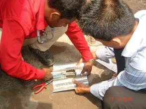Cutting out the tin