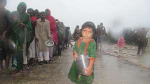 Young girl with water can