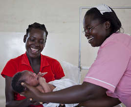 Esther Madudu with mother and newborn