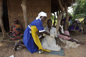 An AMREF midwife at work