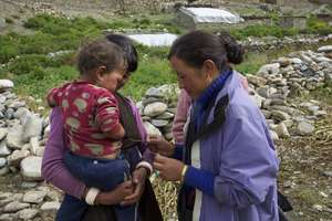 SBA greeting a mother and her baby