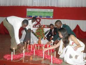 participants light candles
