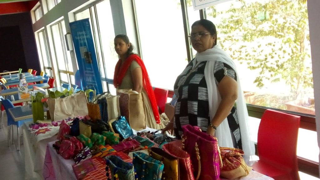 Women at an Exhibition cum sale at a company