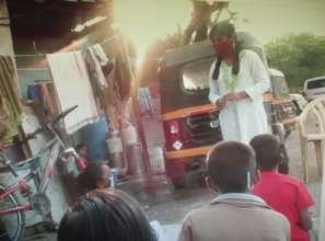 Hema taking class for children in her community