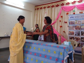 Most motivated parent receiving the Award