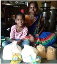 A young girl and mother supported for groceries