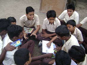 Boys preparing for a community awareness program