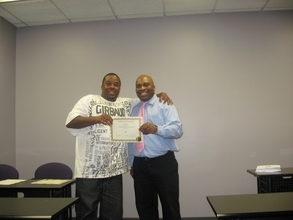 Mr. Myron's big smile at Save Up graduation!