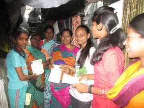 Girls disseminating leaflets on their rights