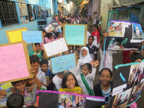 Girls shouting slogans at rally organised by them