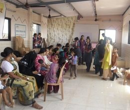 Waiting for their turn- health check up at Malwani