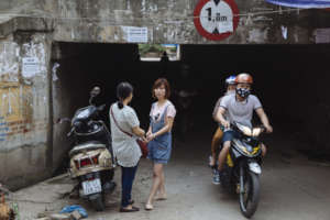 Participant and staff discussing the program.
