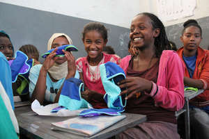 Girls in Ethiopia open their Be Girl products