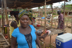 Isha's mother Tokumbo at the marketplace