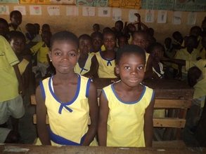 Project team visits Esther and Charity at school