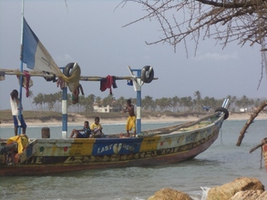 some children at work in the fishing boat