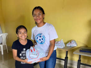 SWB participant receives school supplies