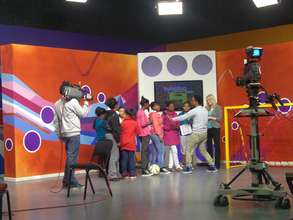 Girls being interviewed by host of Hectic Nine 9