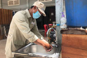 The team embraces COVID-19 measures.