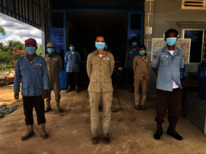 Cambodia staff social distancing with masks