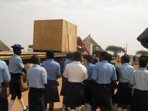 Girls makes preparations for bread making project