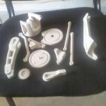 Robotic arm pieces ready to be assembled