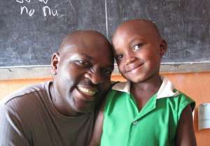 Founder Twesigye with a Kutamba Student