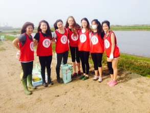 With ASIJ club. Making sand bags