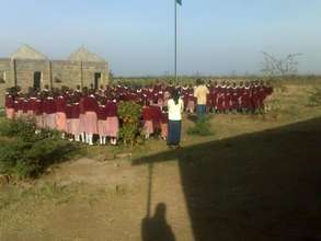 Students in front of the new classroom building