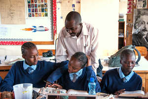 Mr. Charles with the students