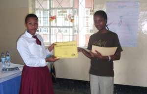 Eliakunda receiving her Year 1 Certificate