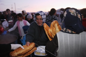 Women receiving food in Van after the earthquake
