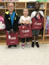 Here are the RAR Bright Red Book Bags and Kids!