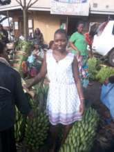 Agnes at her Matoke business in the market