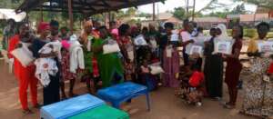 Mothers proudly receiving nutritious porridge pack