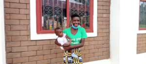 A young mother& her baby at Act4Africa's Centre