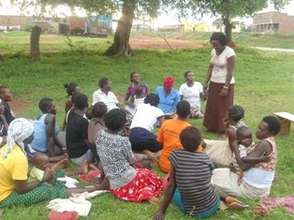 Prossy with a group of young mothers