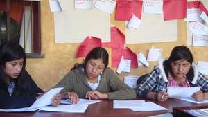 Young leaders reviewing training material