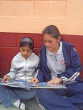 Caroline V. reads with her Little Sister