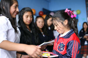 Big & Little Sisters Exchanging Keepsake Books