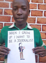 Evaristo with a drawing of himself as a journalist