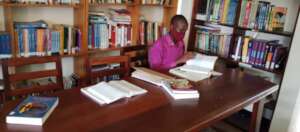 Christopher In The Nyaka Library