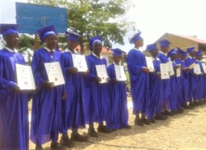 Students with their certificates of completion